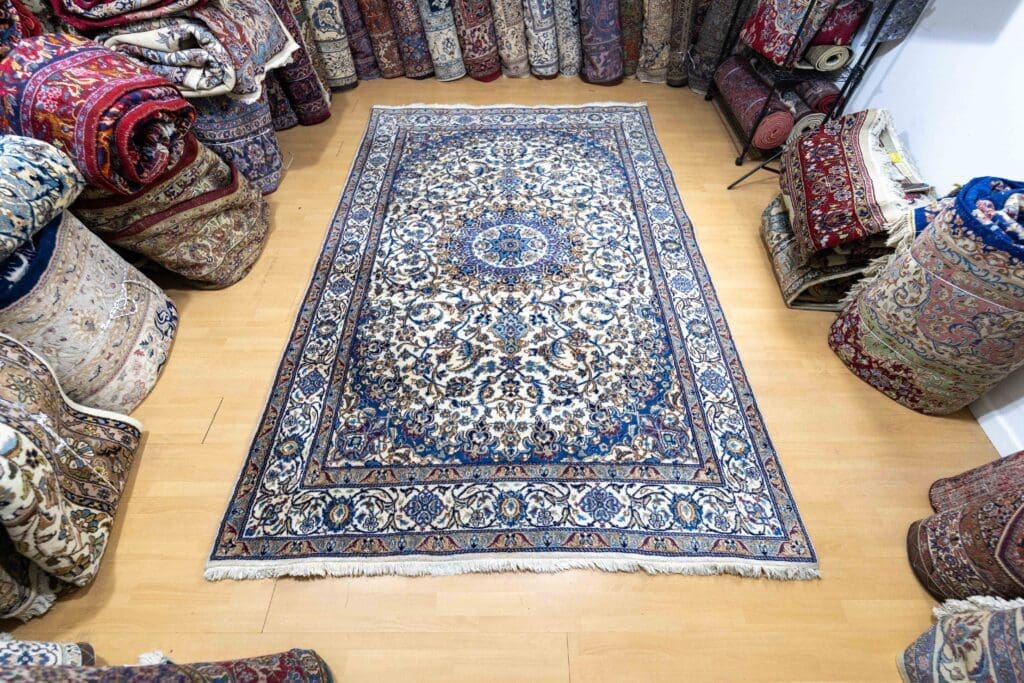 Perserteppich Nain 297 x 195 cm Wolle handgeknüpft (Verkauft)