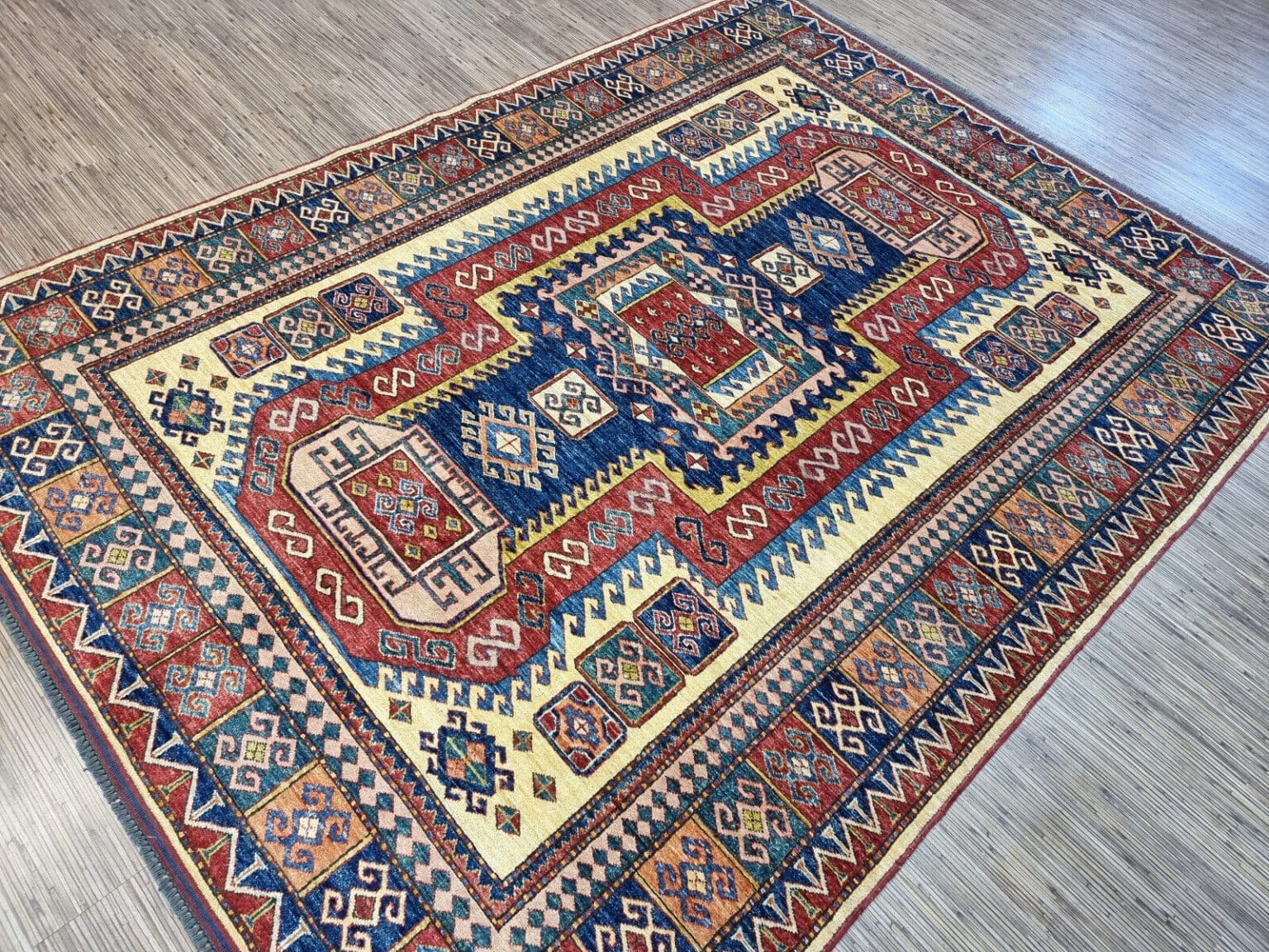 Orientteppich Kazak 239 x 179 cm Wolle handgeknüpft