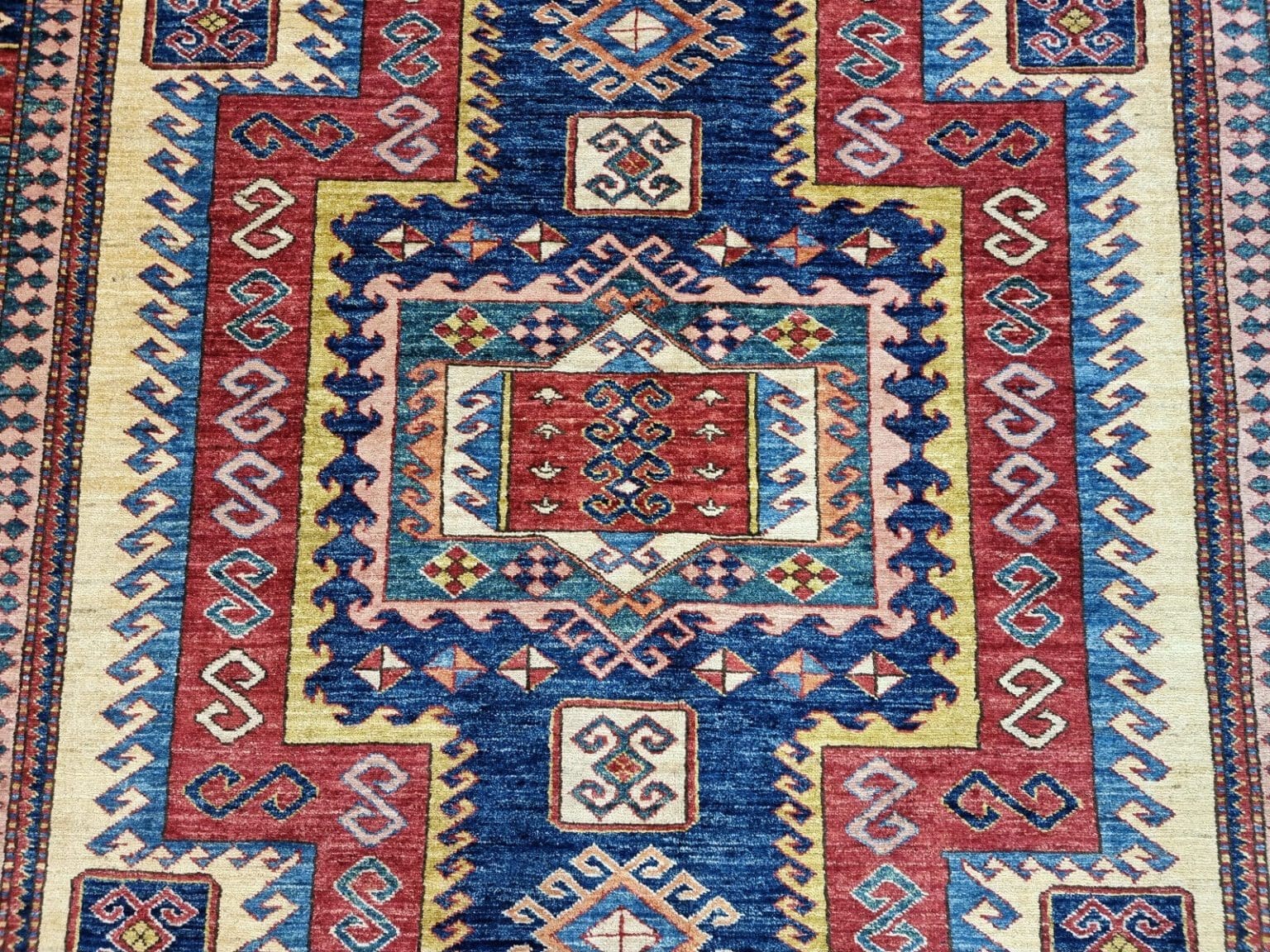 Orientteppich Kazak 239 x 179 cm Wolle handgeknüpft