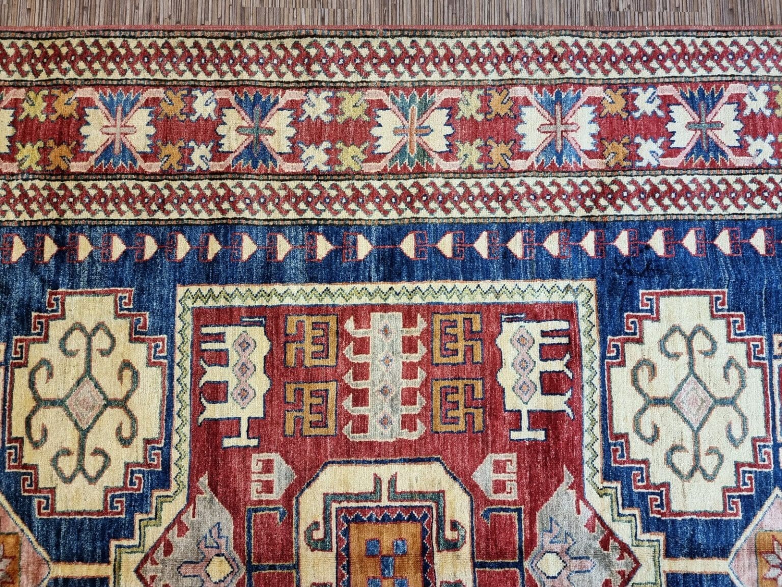 wunderschoner-original-pakistanischer-kazak-teppich-231x175-cm-1-7 Orientteppich Kazak 231 x 175 cm Wolle handgeknüpft