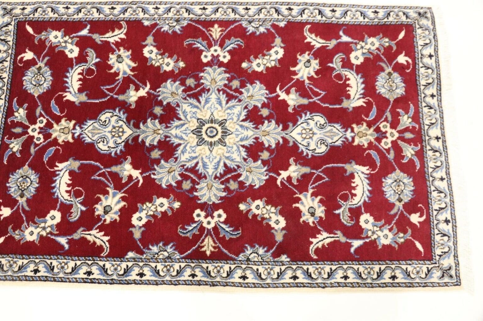 Perserteppich Nain 138 x 88 cm Wolle handgeknüpft
