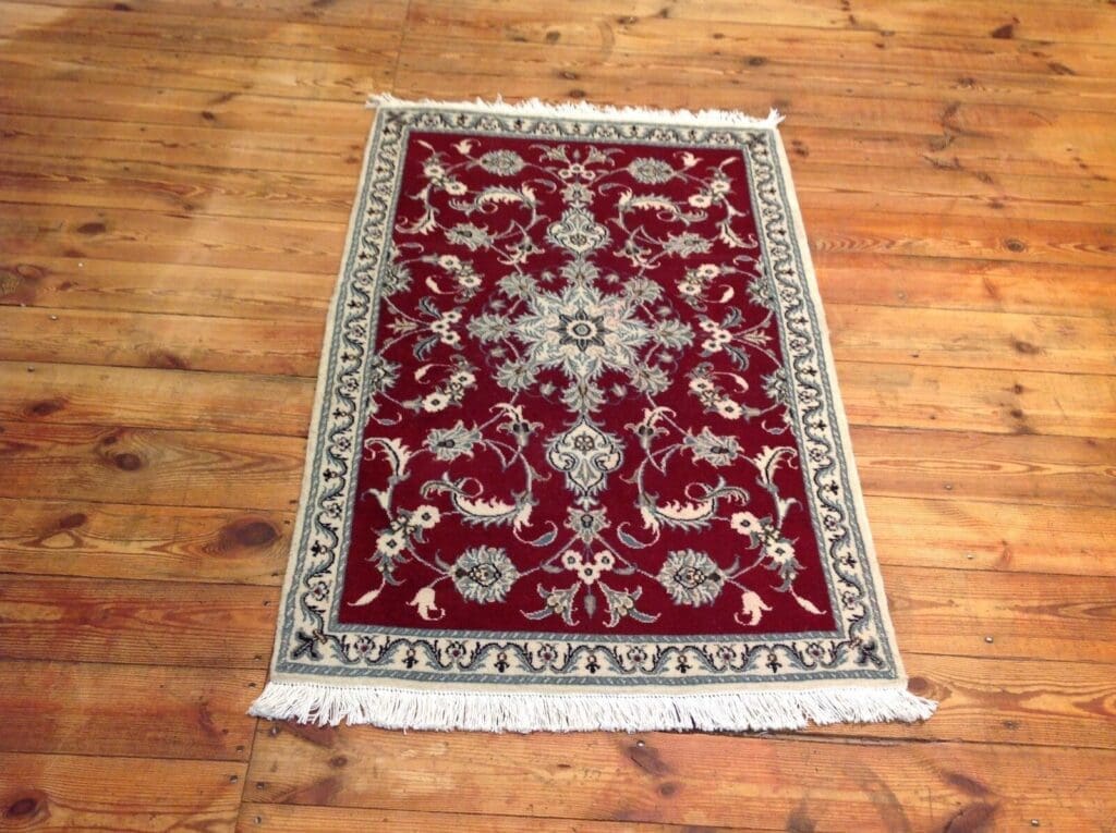 Perserteppich Nain 138 x 90 cm Wolle handgeknüpft
