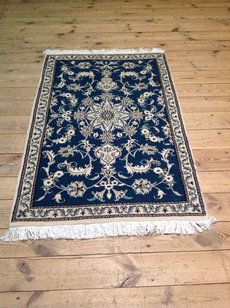 Perserteppich Nain 138 x 88 cm Schurwolle handgeknüpft