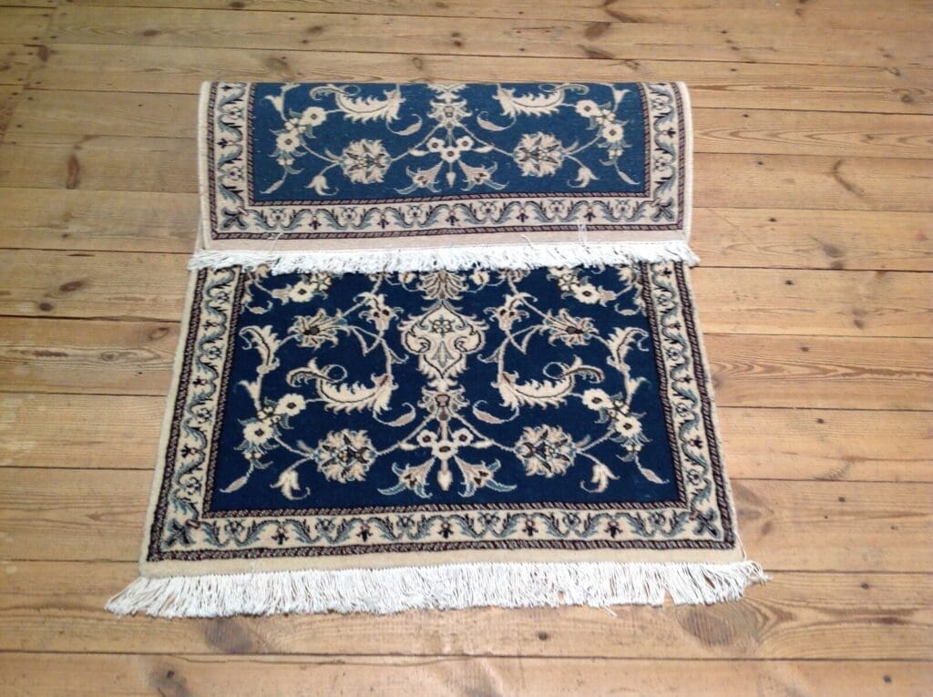 Perserteppich Nain 138 x 88 cm Schurwolle handgeknüpft