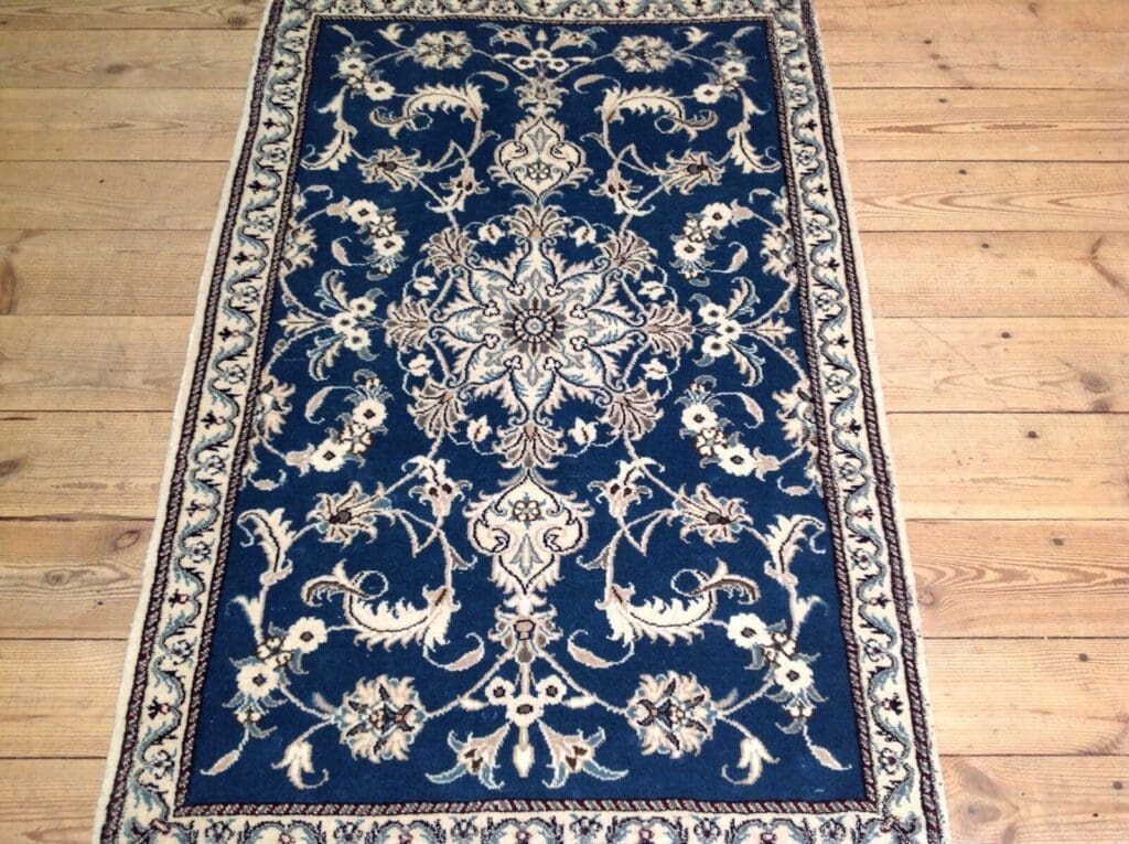 Perserteppich Nain 138 x 88 cm Schurwolle handgeknüpft
