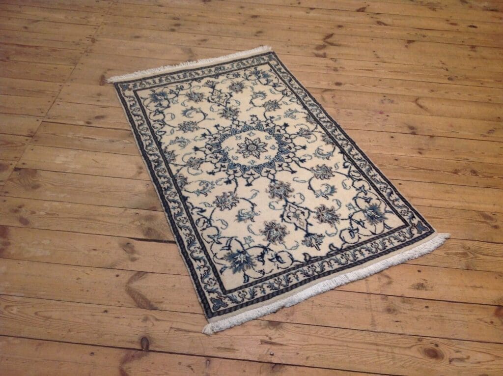 Perserteppich Nain 135 x 85 cm Wolle handgeknüpft