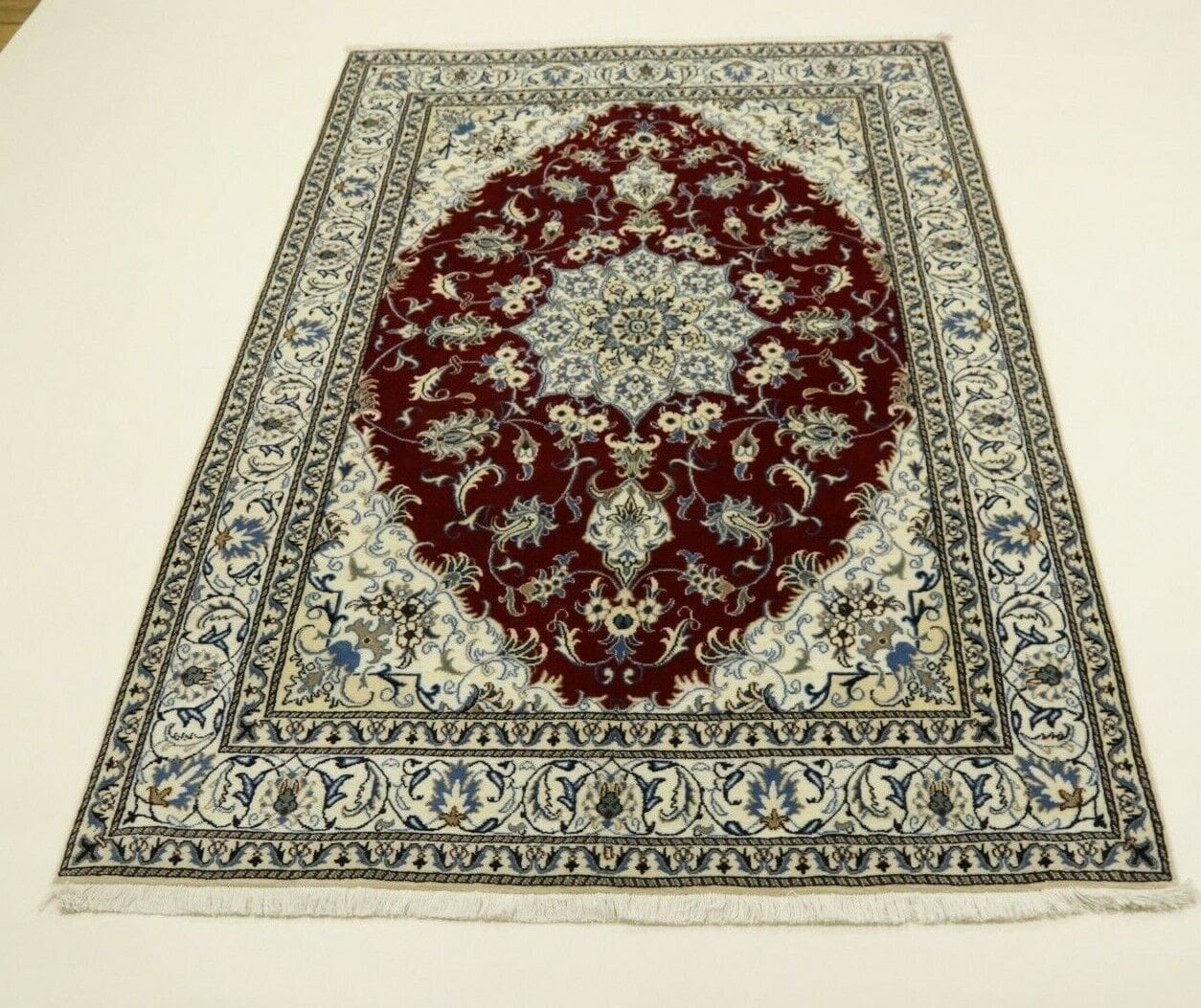 Perserteppich Nain 234 x 170 cm Wolle handgeknüpft