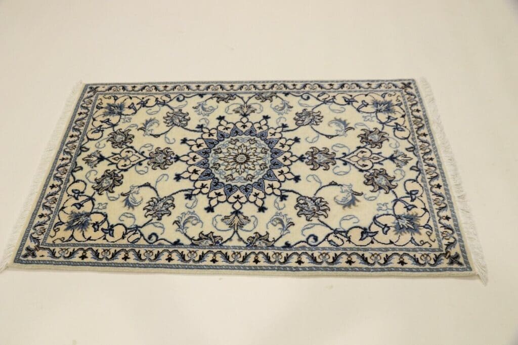 Perserteppich Nain 140 x 88 cm Schurwolle handgeknüpft