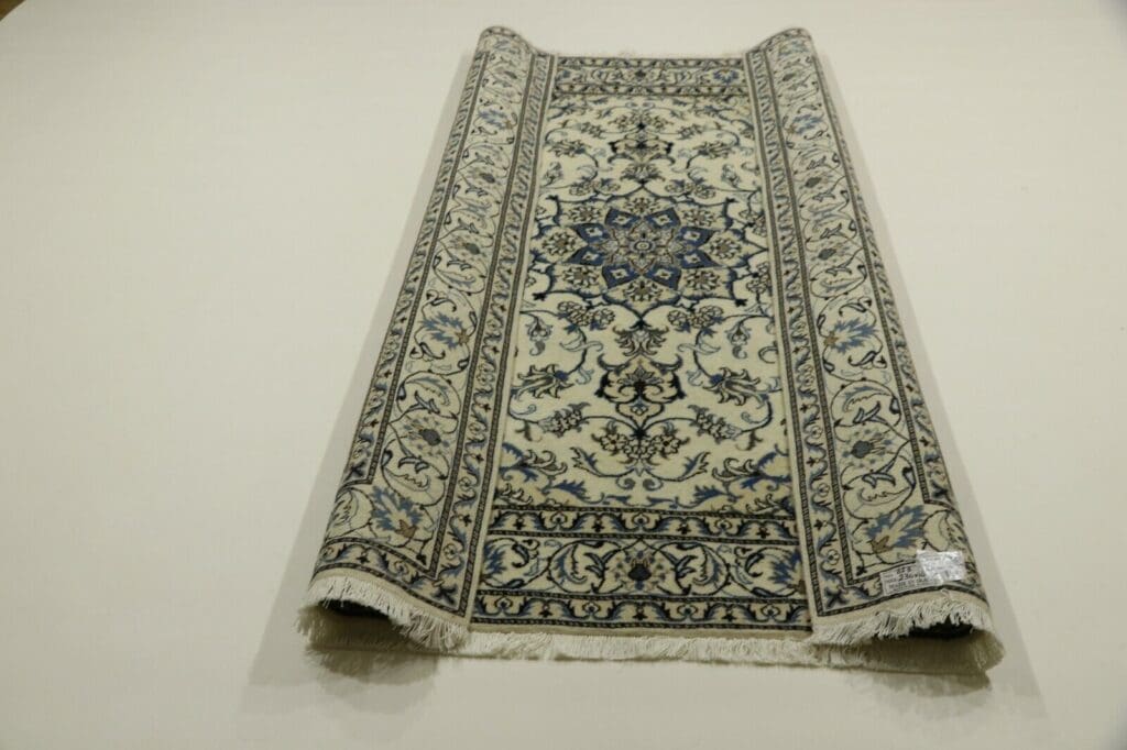 Perserteppich Nain 230 x 168 cm Wolle handgeknüpft