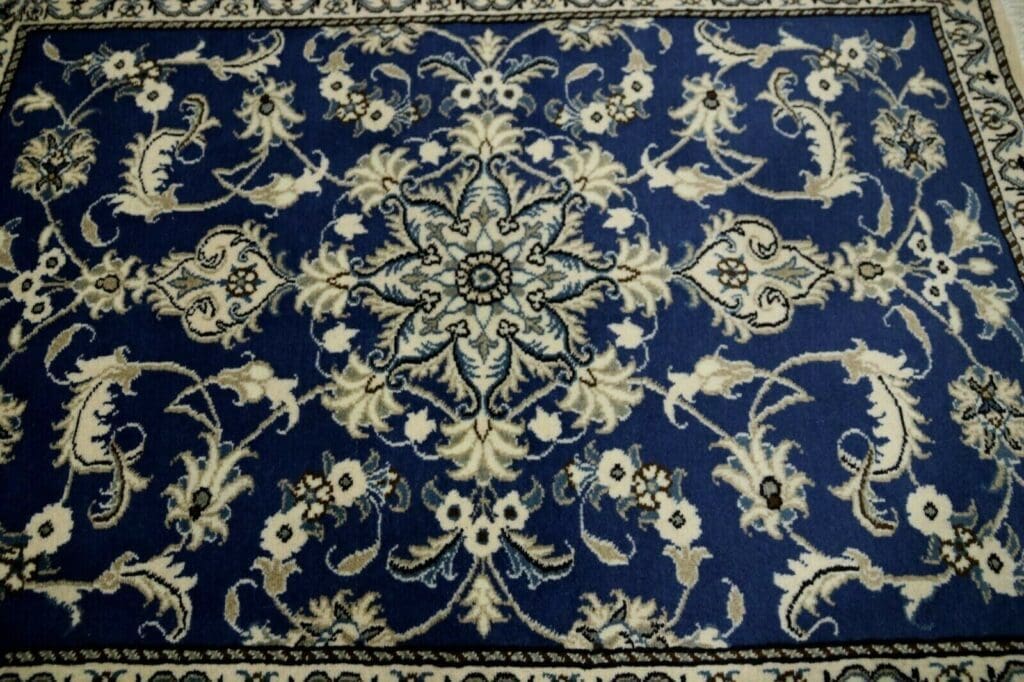 Perserteppich Nain 134 x 89 cm Wolle handgeknüpft