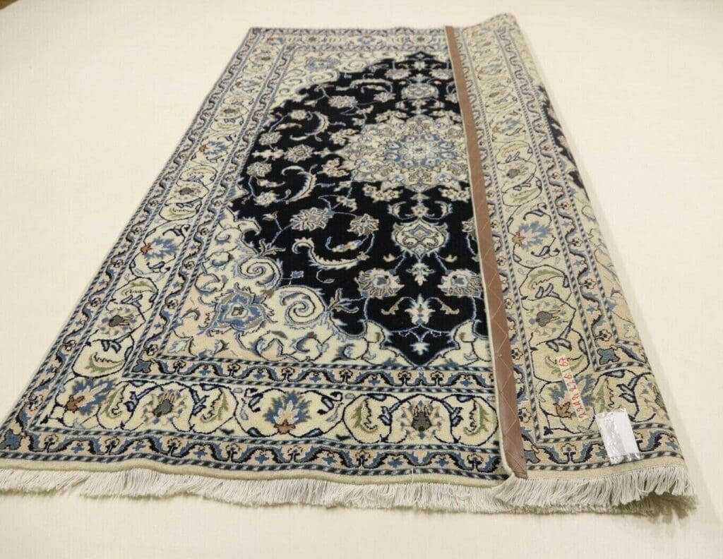 Perserteppich Nain 226 x 167 cm Wolle handgeknüpft