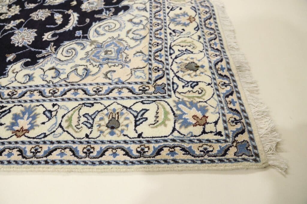 Perserteppich Nain 226 x 167 cm Wolle handgeknüpft
