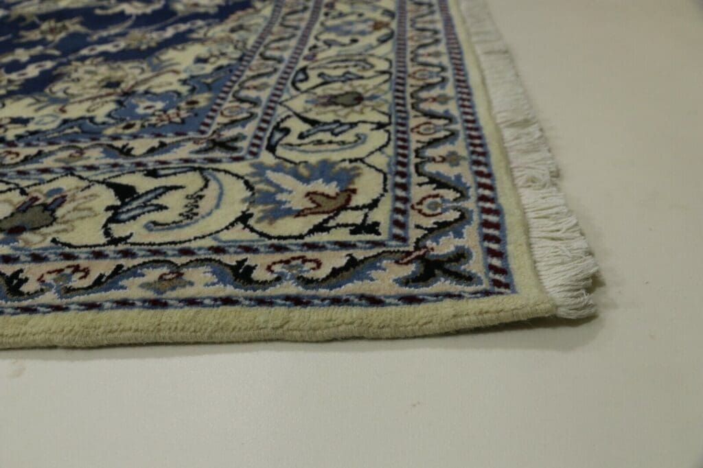 Perserteppich Nain 230 x 169 cm Wolle handgeknüpft
