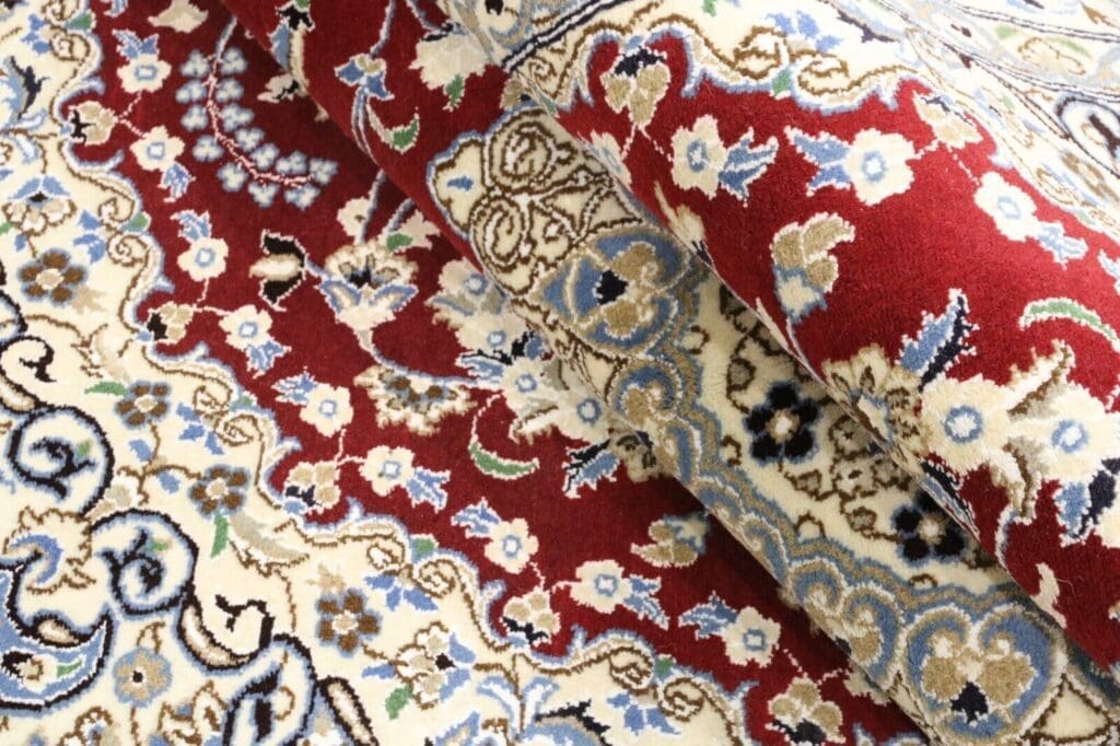 Perserteppich Nain 9la 240 x 158 cm Wolle handgeknüpft