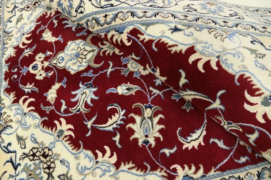 Perserteppich Nain 235 x 164 cm Wolle handgeknüpft