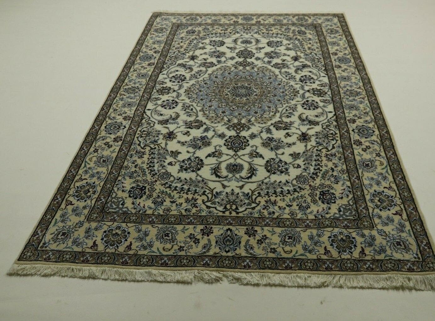 Perserteppich Nain 256 x 165 cm Wolle handgeknüpft