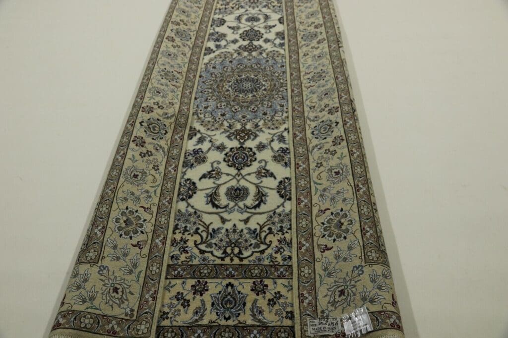 Perserteppich Nain 256 x 165 cm Wolle handgeknüpft