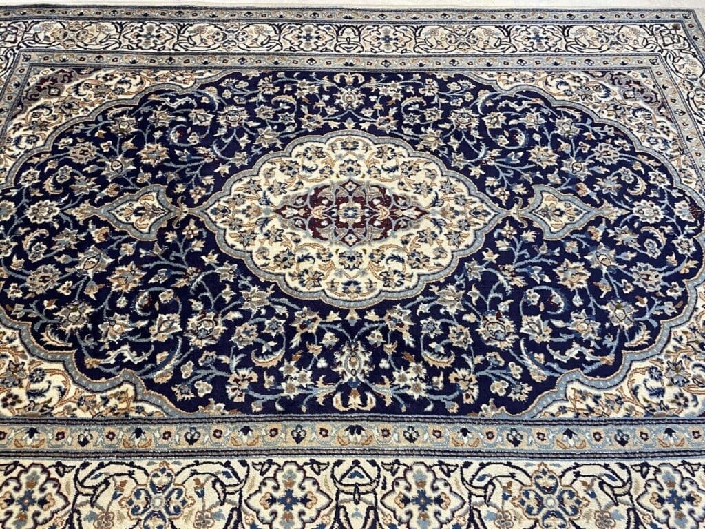 Perserteppich Nain 300 x 200 cm Wolle Seide handgeknüpft