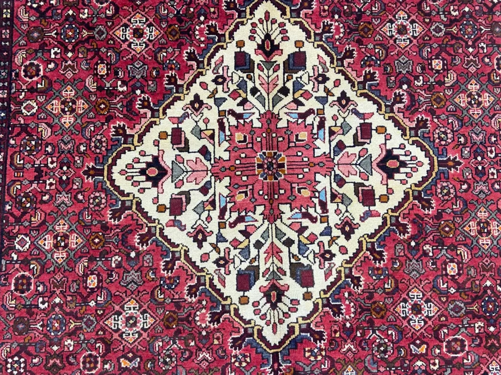 Perserteppich Hosseinabad 327 x 217 cm Wolle handgeknüpft
