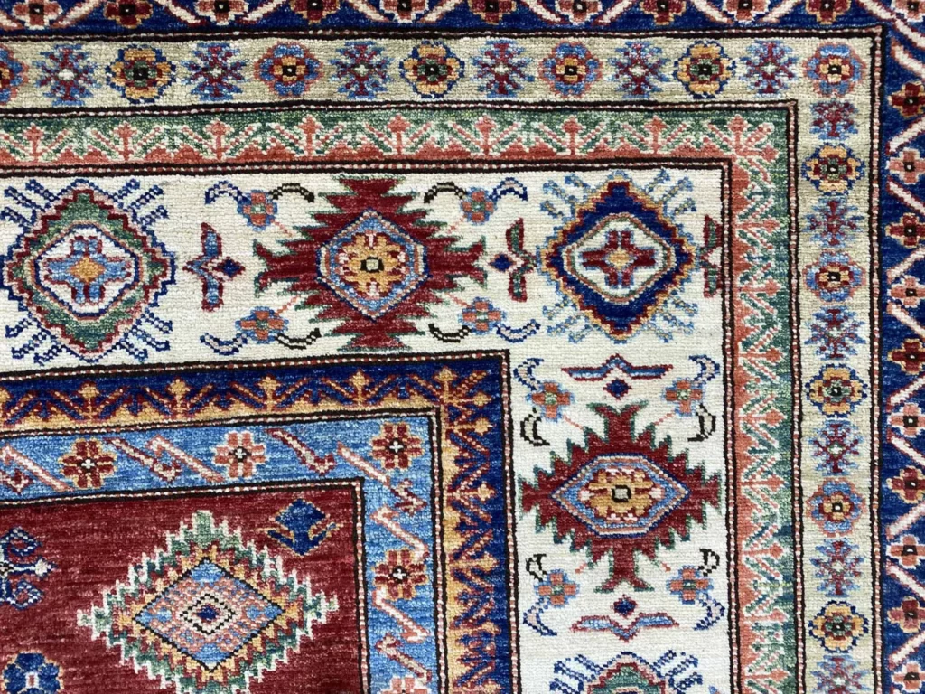 Orientteppich Kazak 297 x 209 cm Wolle handgeknüpft