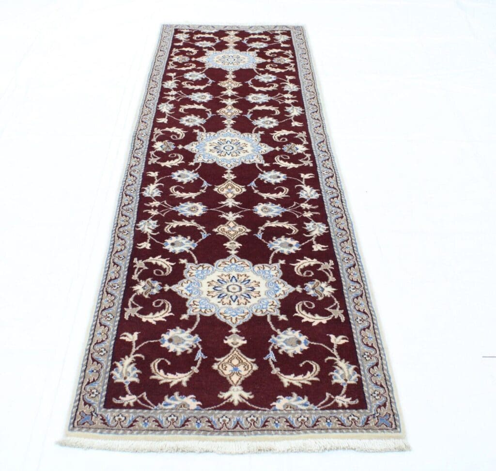 Perserteppich Nain 297 x 79 cm Wolle handgeknüpft
