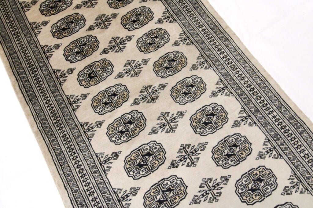 Orientteppich Pakistan 304x79 cm Wolle handgeknüpft