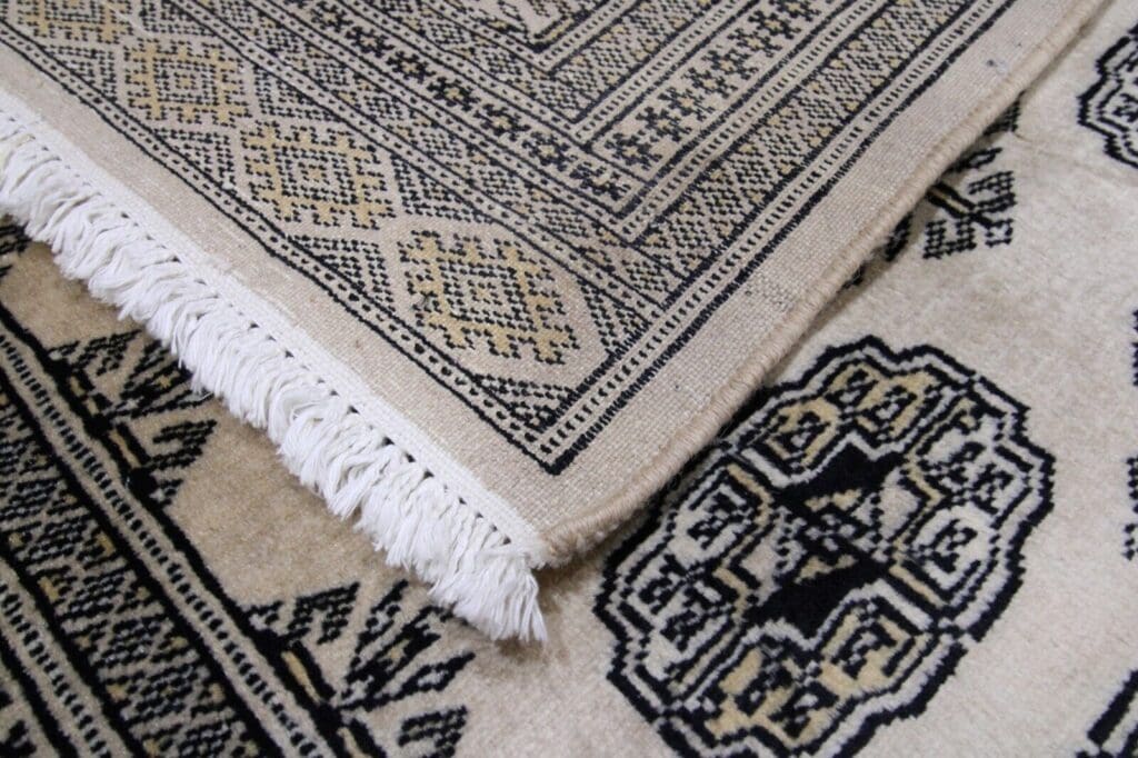 Orientteppich Pakistan 304x79 cm Wolle handgeknüpft