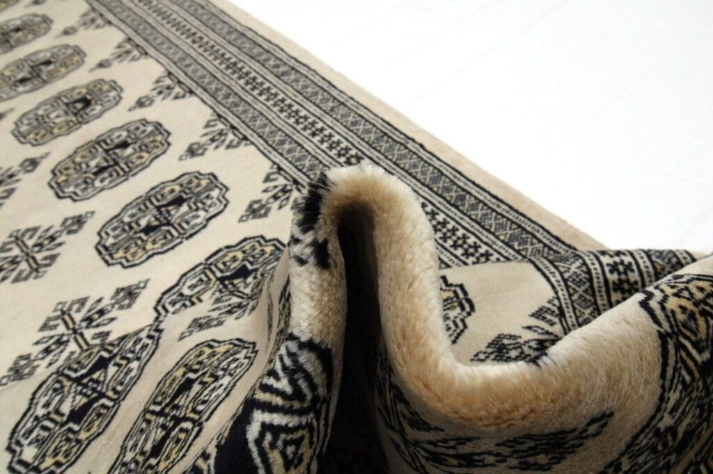 Orientteppich Pakistan 304x79 cm Wolle handgeknüpft