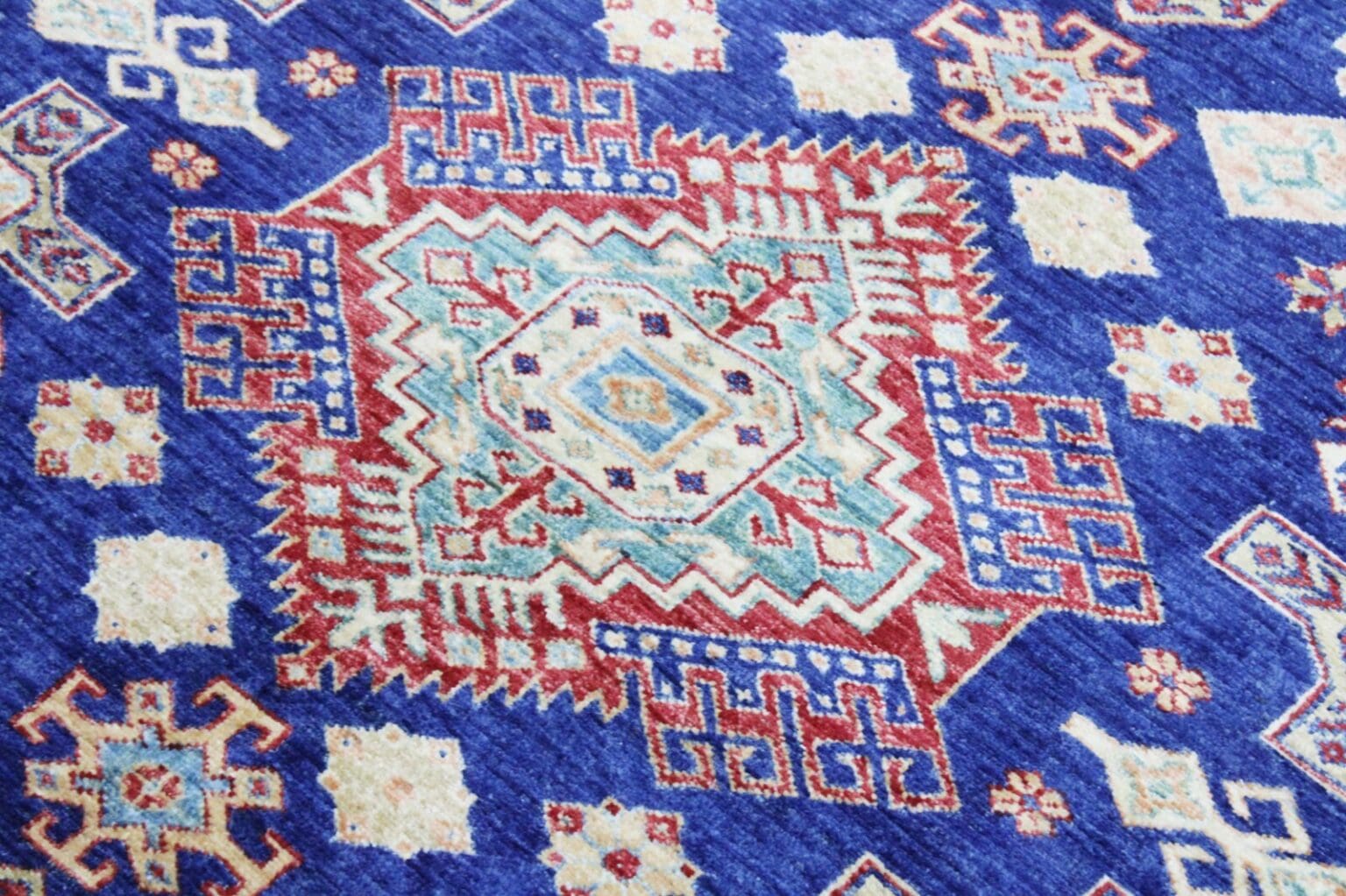 Orientteppich Kazak 242x165 cm Hochlandwolle handgeknüpft