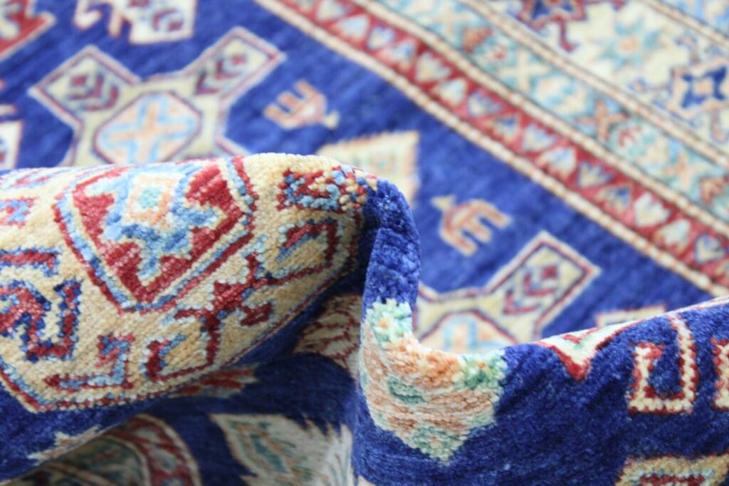 Orientteppich Kazak 242x165 cm Hochlandwolle handgeknüpft