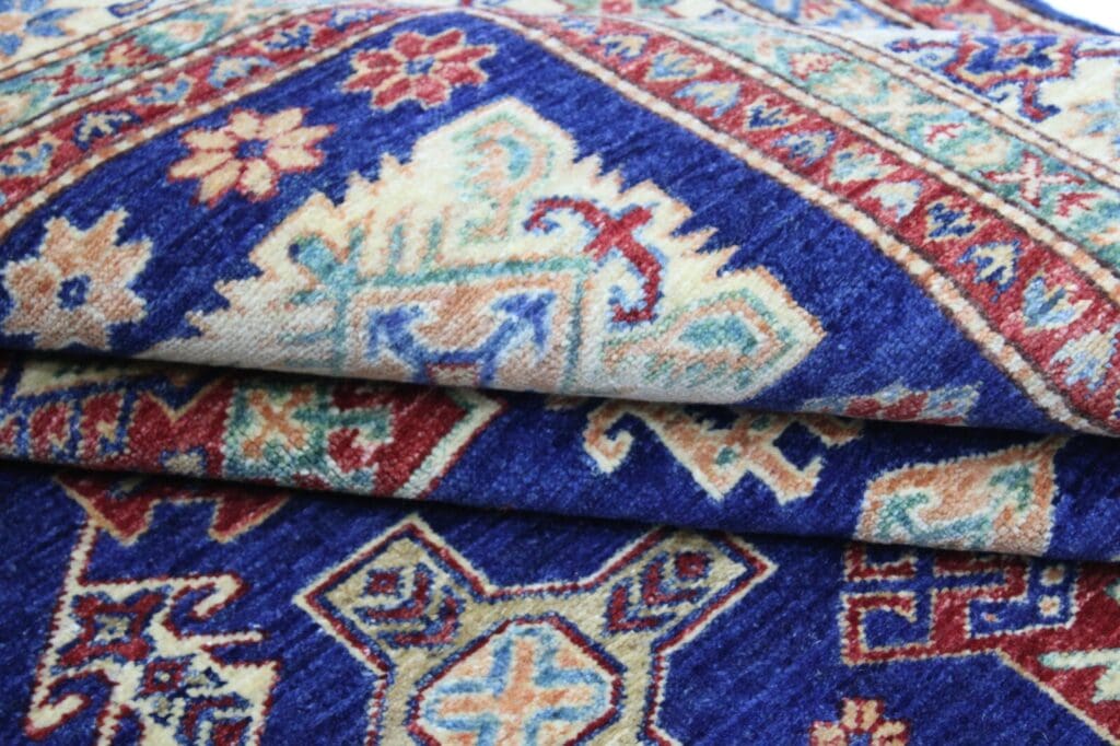 Orientteppich Kazak 242x165 cm Hochlandwolle handgeknüpft