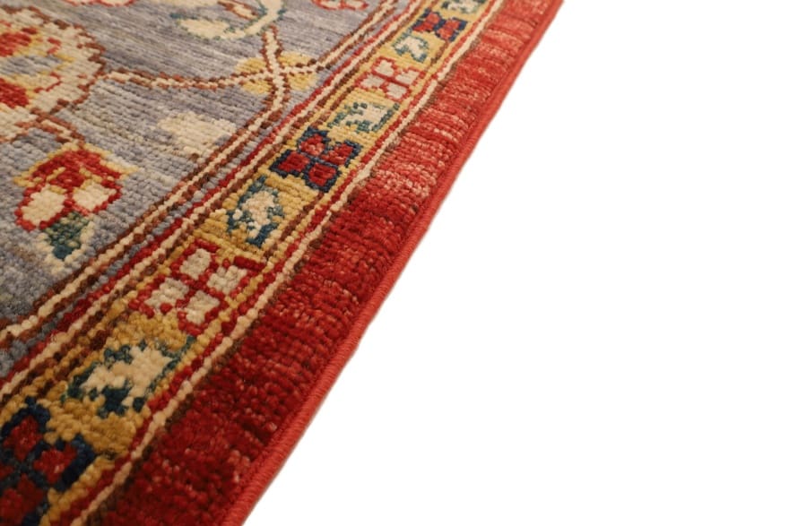 Heriz Ziegler Orientteppich 305 × 202 cm aus Wolle, handgeknüpft