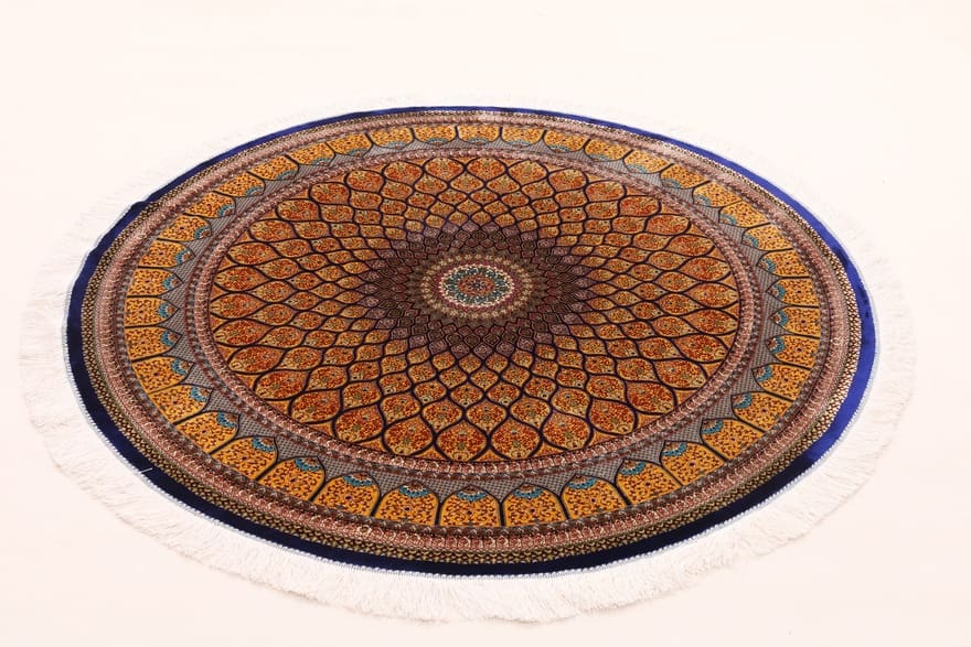 eleganter-runder-seidenteppich-152x151-cm-in-braun-gelb-perserteppich-1 Handgefertigter Ghom Perserteppich, 150 × 150 cm