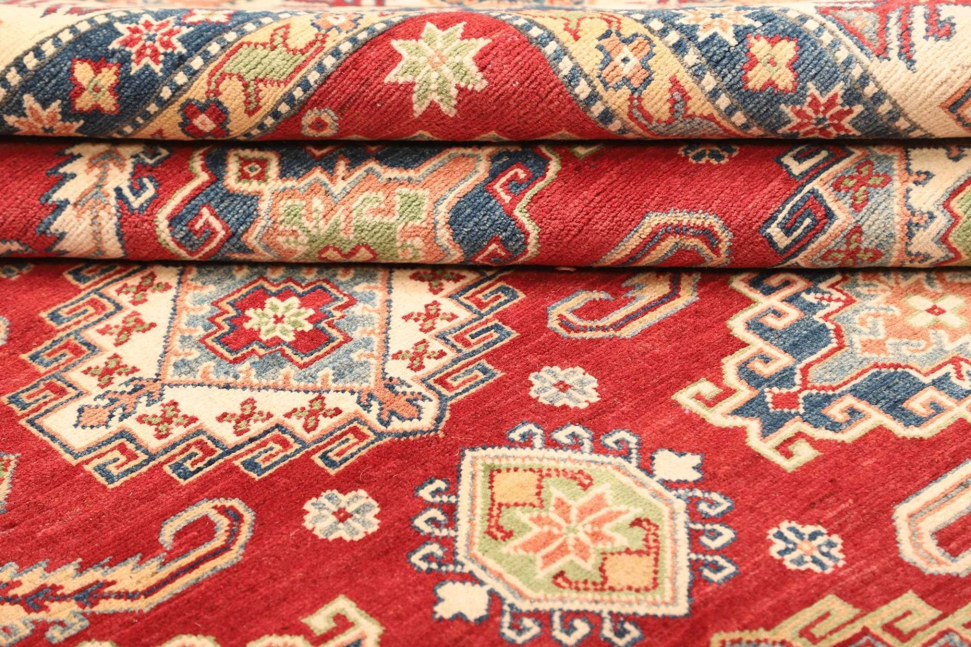 Kazak Orientteppich 276 × 360 cm aus Wolle, handgeknüpft