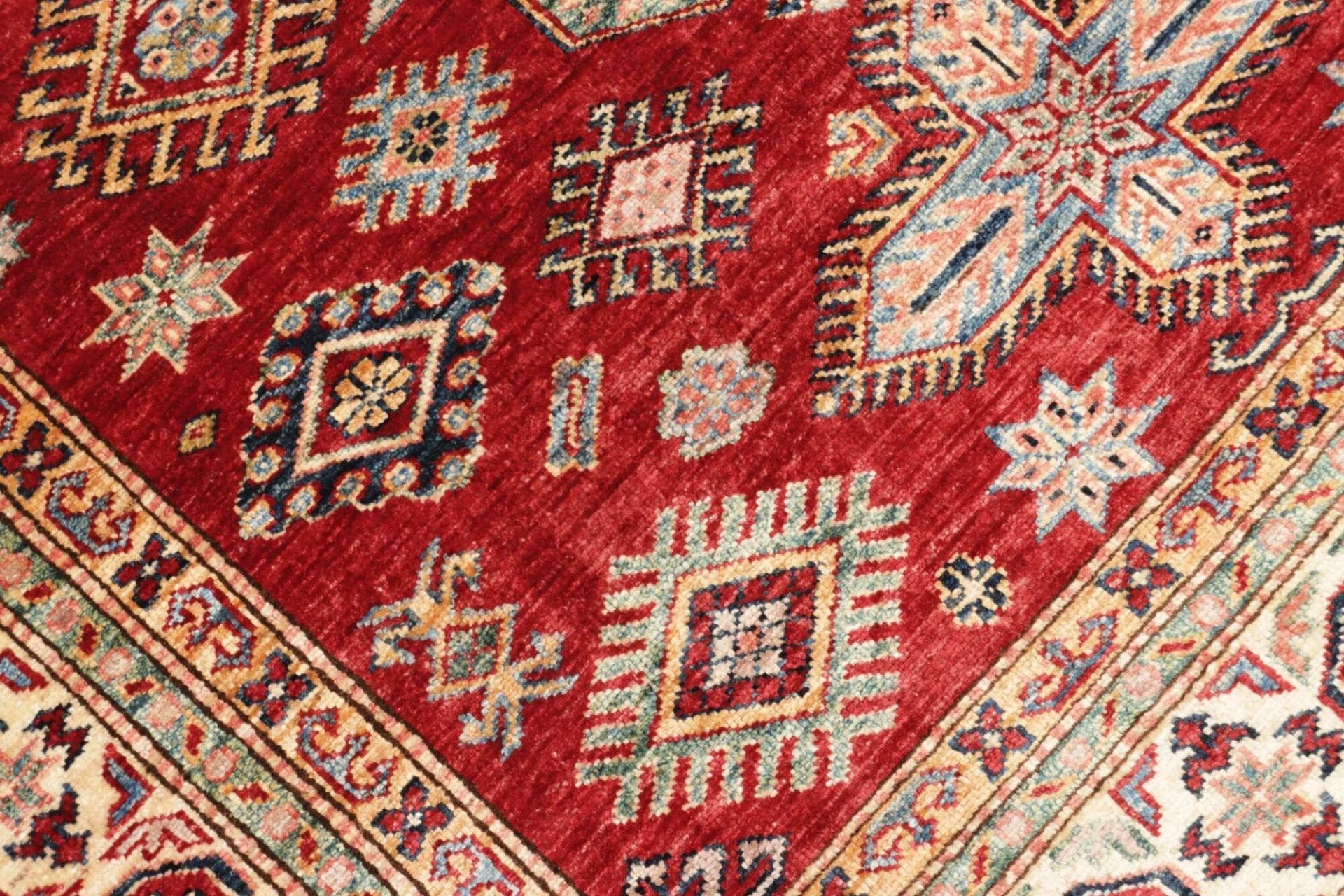 Kazak Orientteppich 148 × 190 cm aus Wolle, handgeknüpft