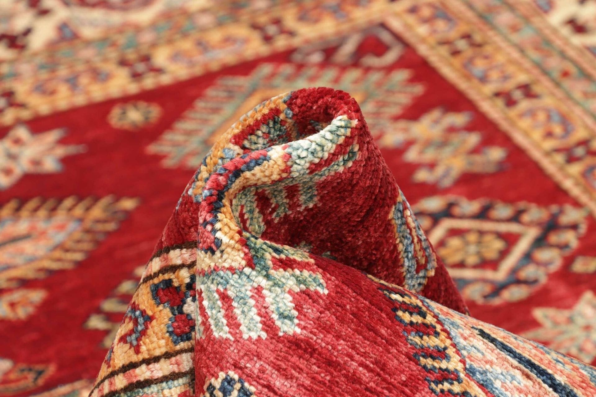 Kazak Orientteppich 148 × 190 cm aus Wolle, handgeknüpft