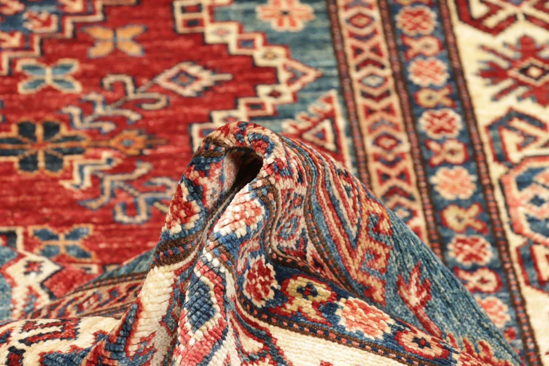 Kazak Orientteppich 123 × 184 cm aus Wolle, handgeknüpft