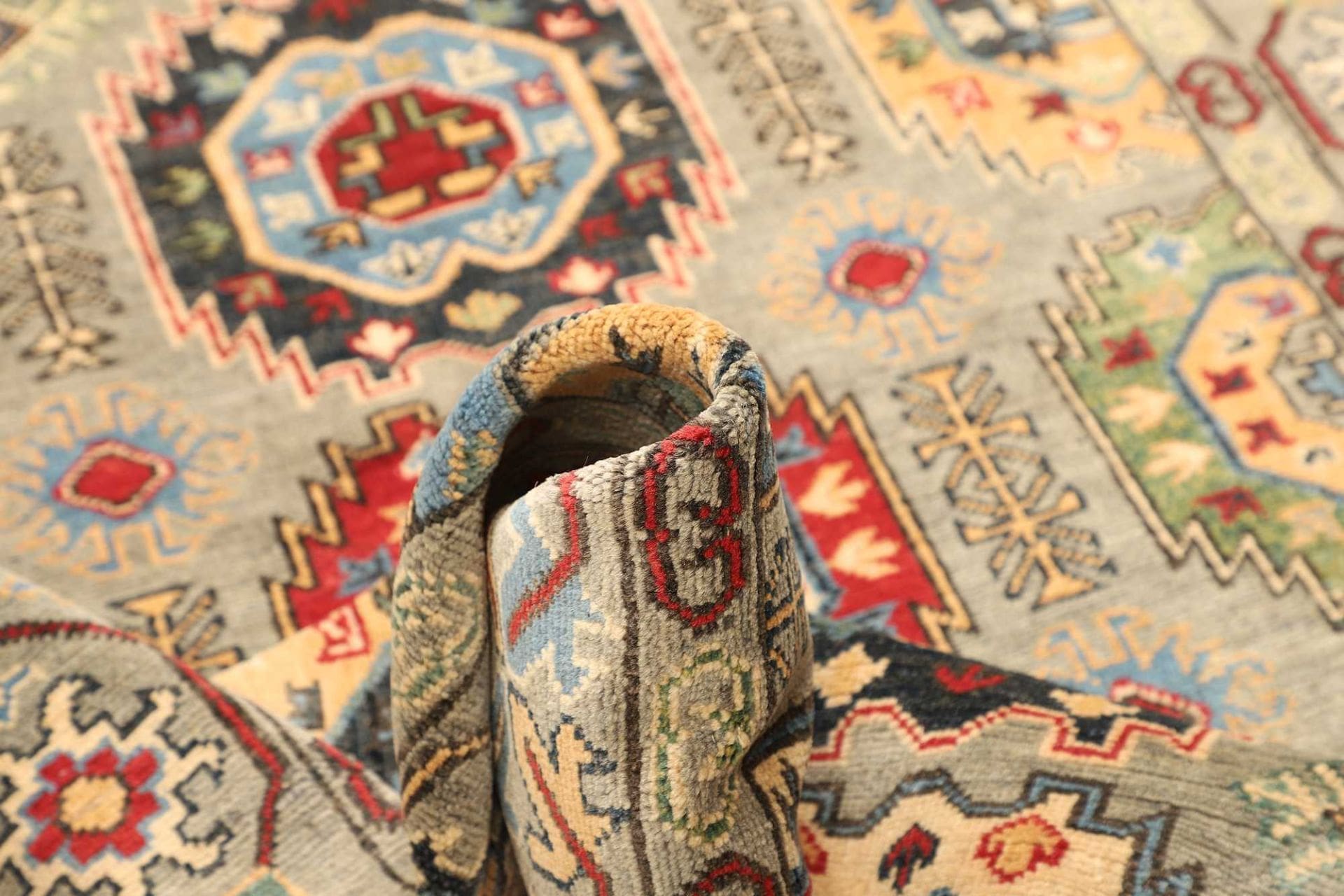 Kazak Orientteppich 125 × 178 cm aus Wolle, handgeknüpft