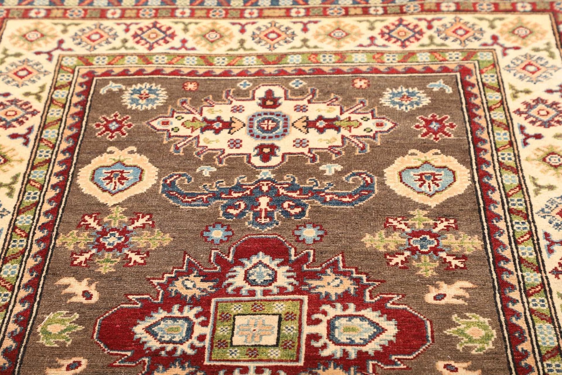 Kazak Orientteppich 124 × 193 cm aus Wolle, handgeknüpft
