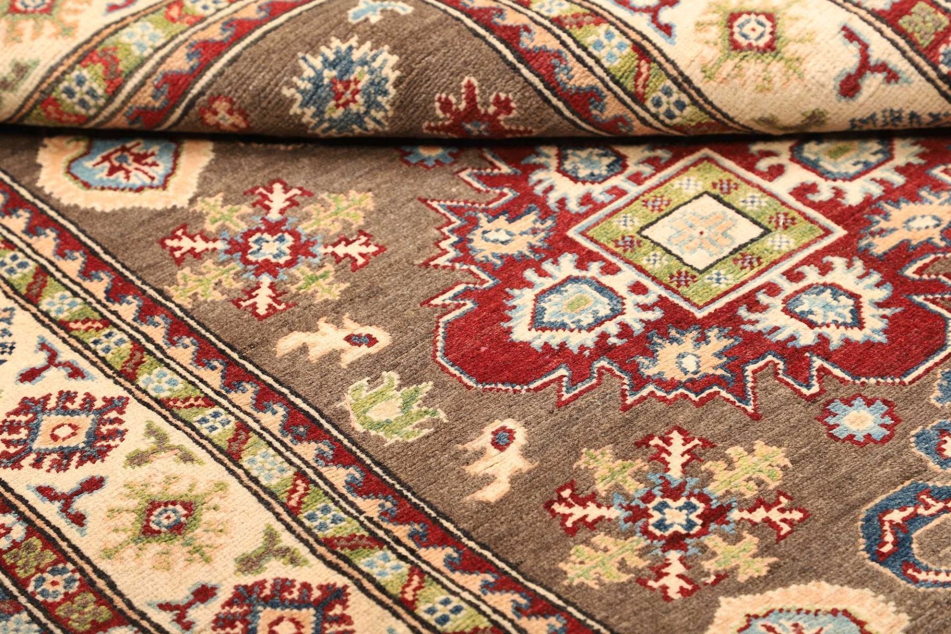 Kazak Orientteppich 124 × 193 cm aus Wolle, handgeknüpft