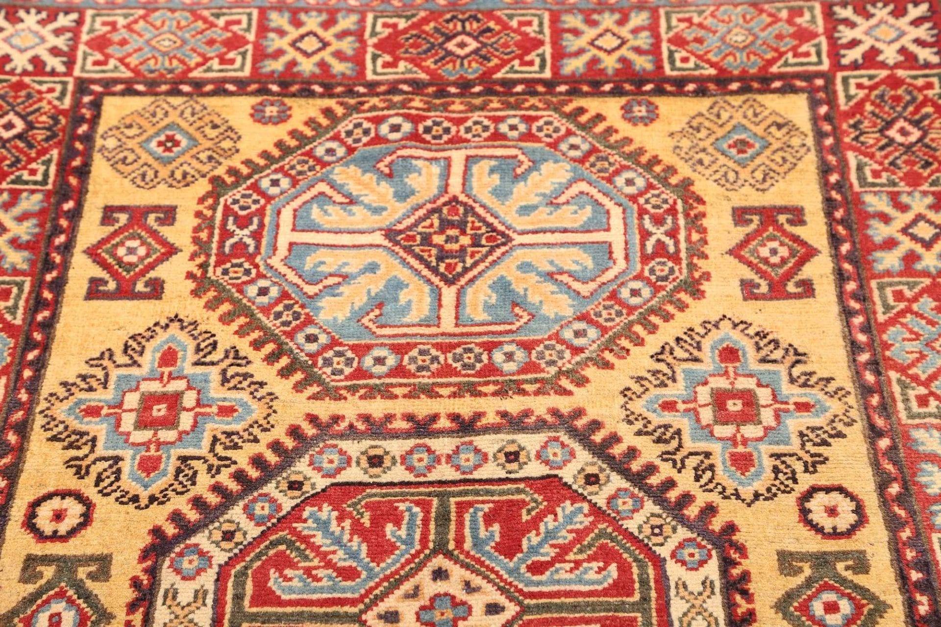 Kazak Orientteppich 103 × 153 cm aus Wolle, handgeknüpft