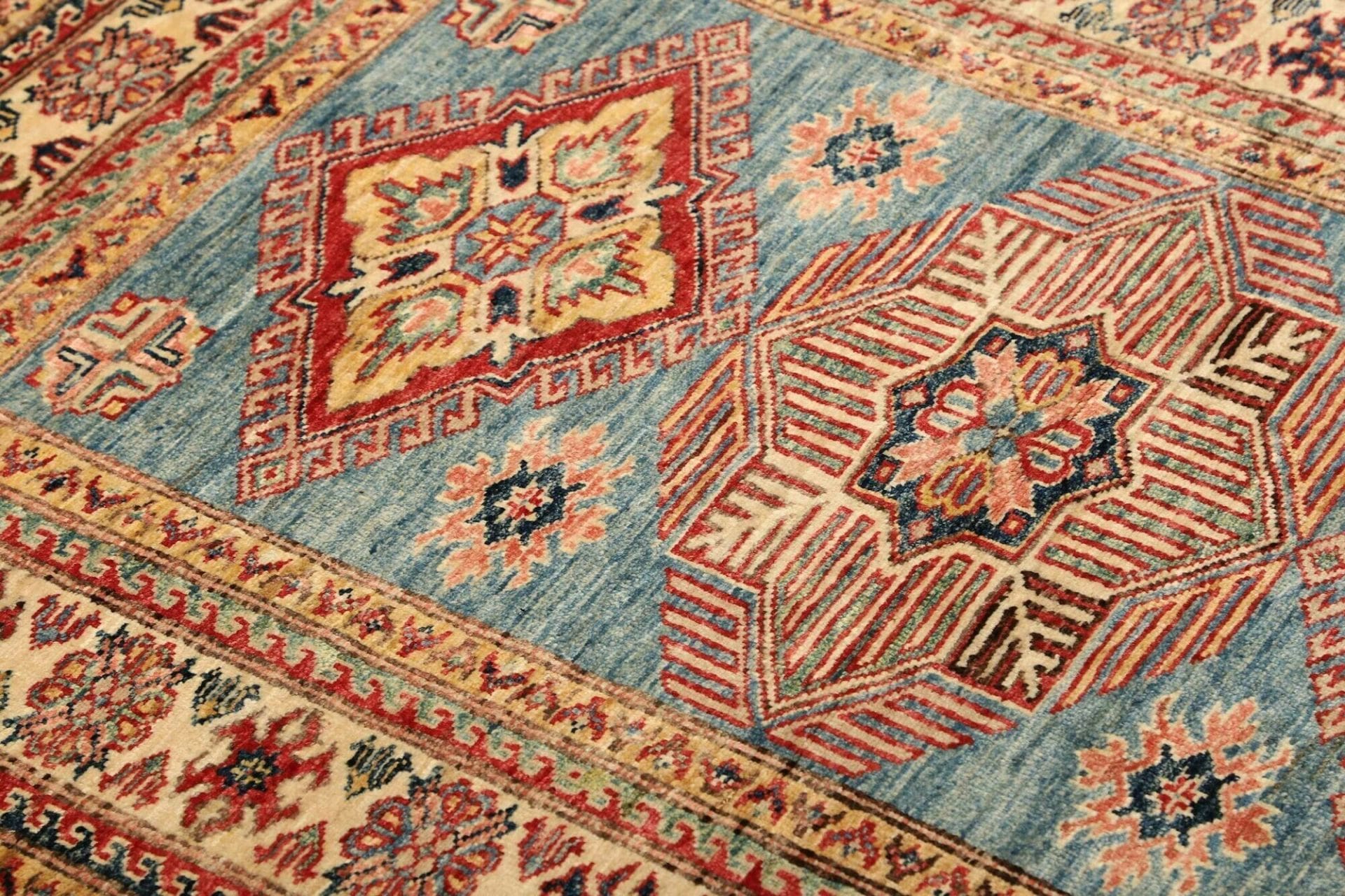 Kazak Orientteppich aus Pakistan, 103 × 134 cm