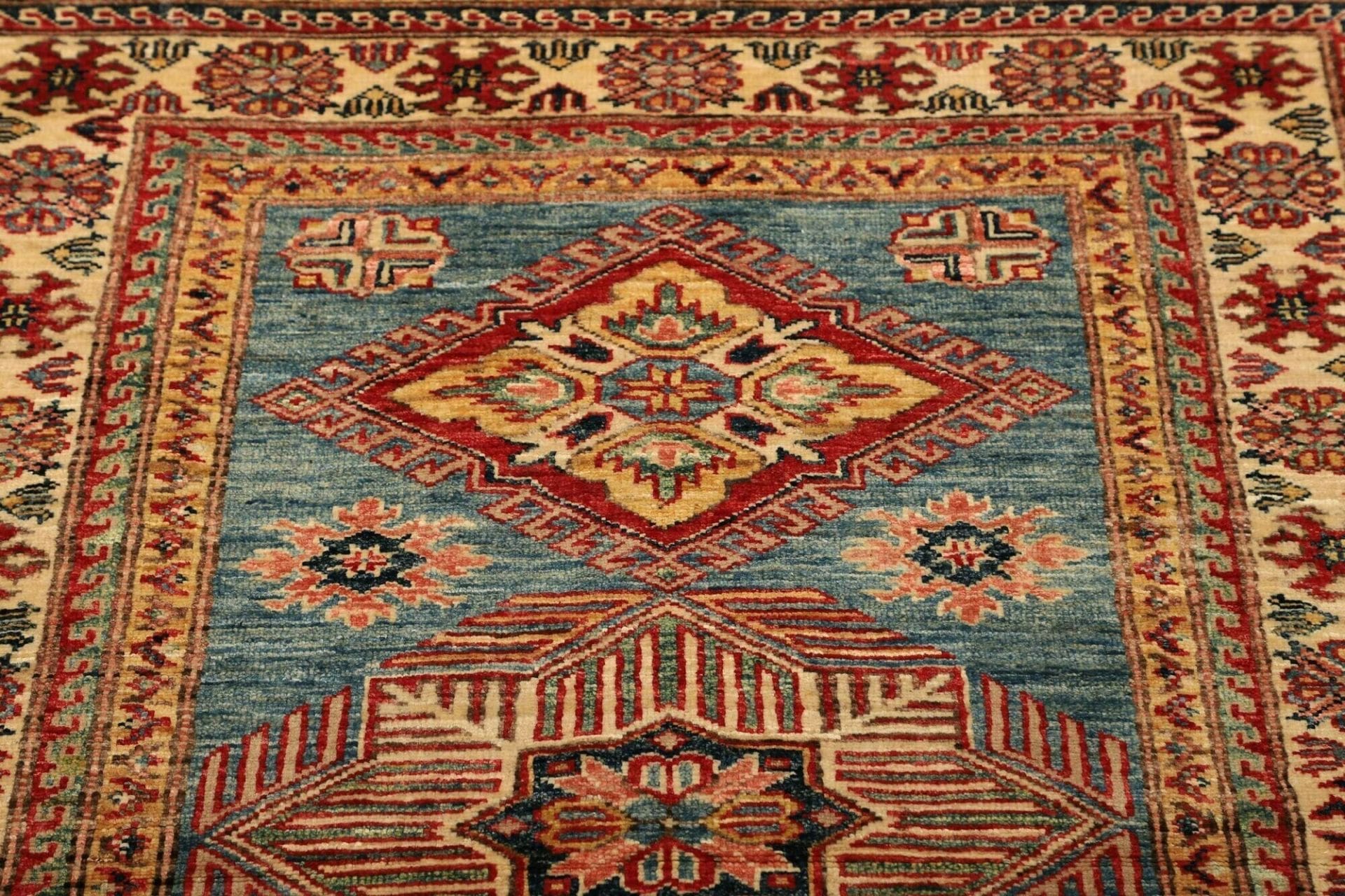 Kazak Orientteppich aus Pakistan, 103 × 134 cm