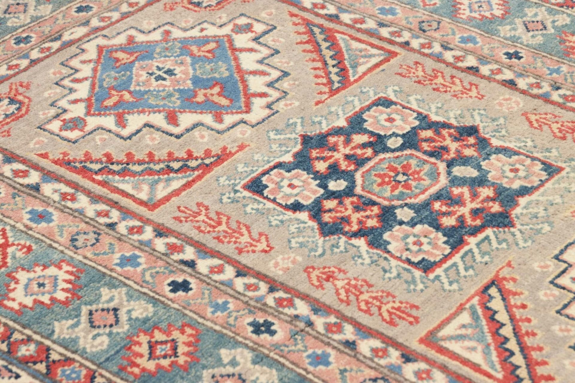 Kazak Orientteppich 108 × 157 cm aus Wolle, handgeknüpft