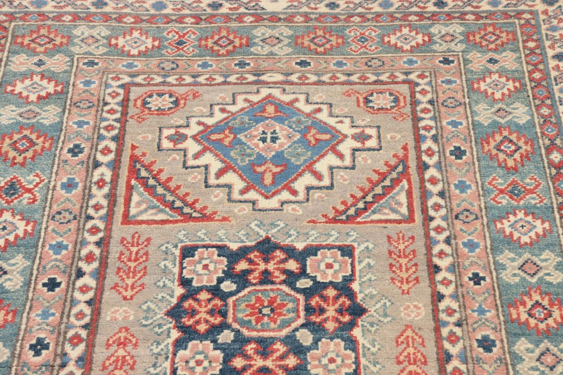 Kazak Orientteppich 108 × 157 cm aus Wolle, handgeknüpft
