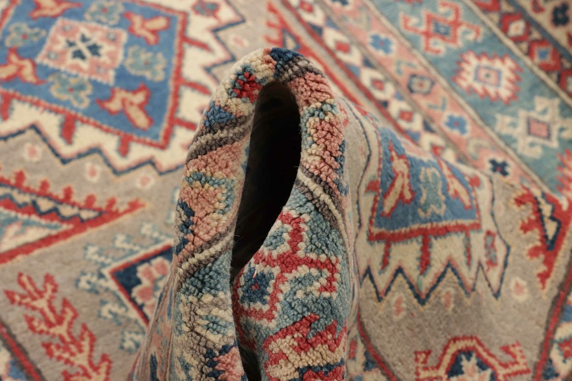 Kazak Orientteppich 108 × 157 cm aus Wolle, handgeknüpft