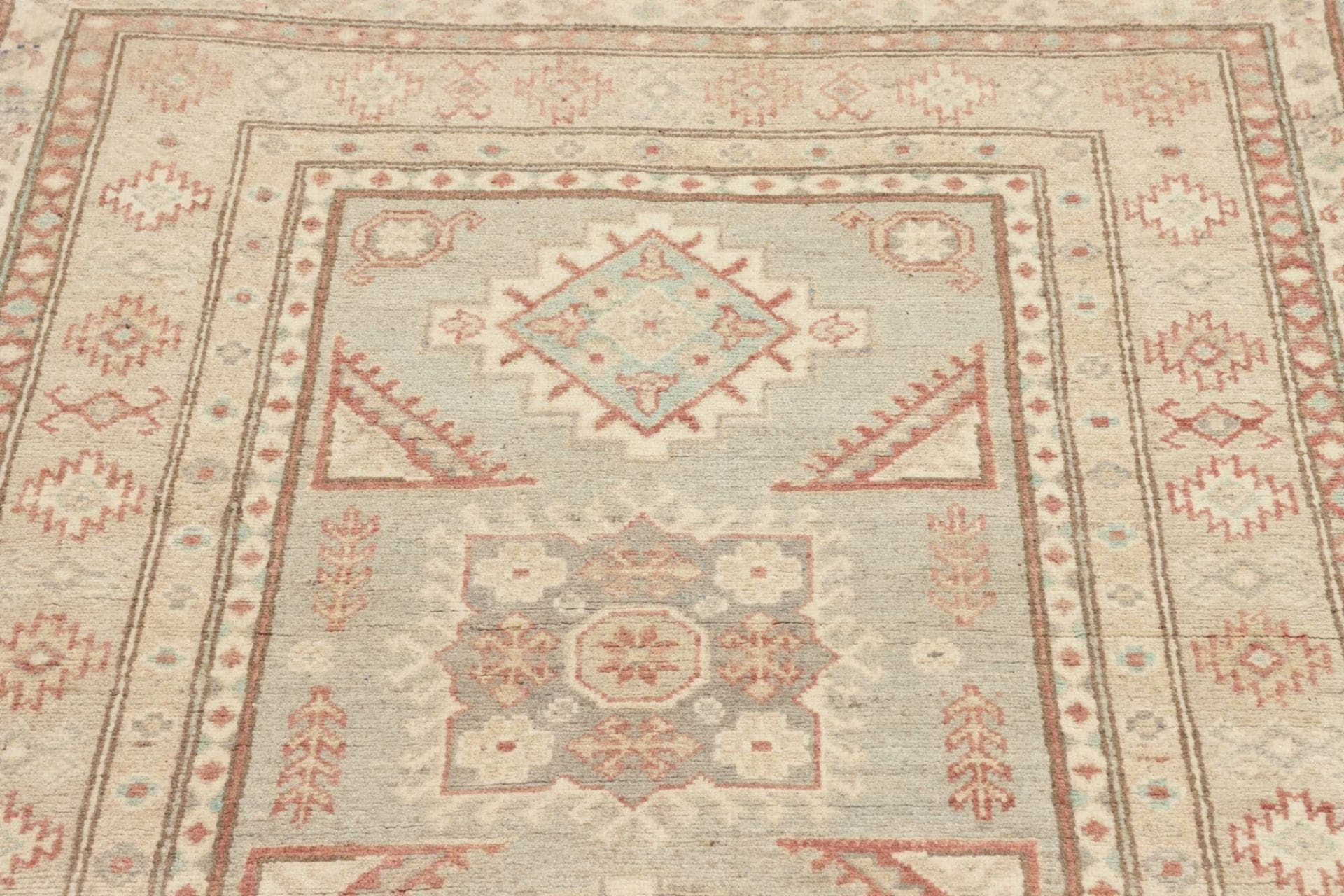Kazak Orientteppich 106 × 143 cm aus Wolle, handgeknüpft