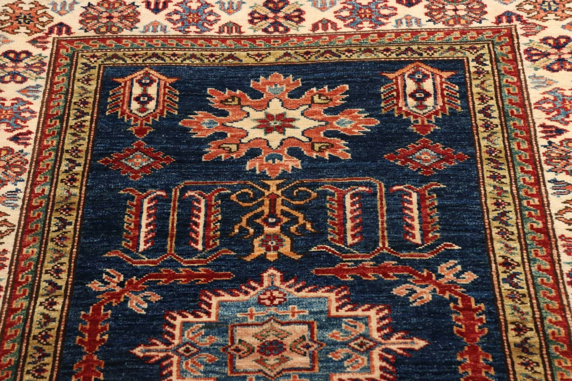 Kazak Orientteppich 106 × 148 cm aus Wolle, handgeknüpft