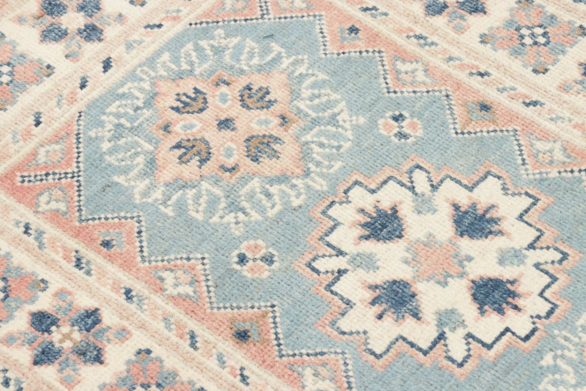 Kazak Orientteppich 66 × 92 cm aus Wolle, handgeknüpft