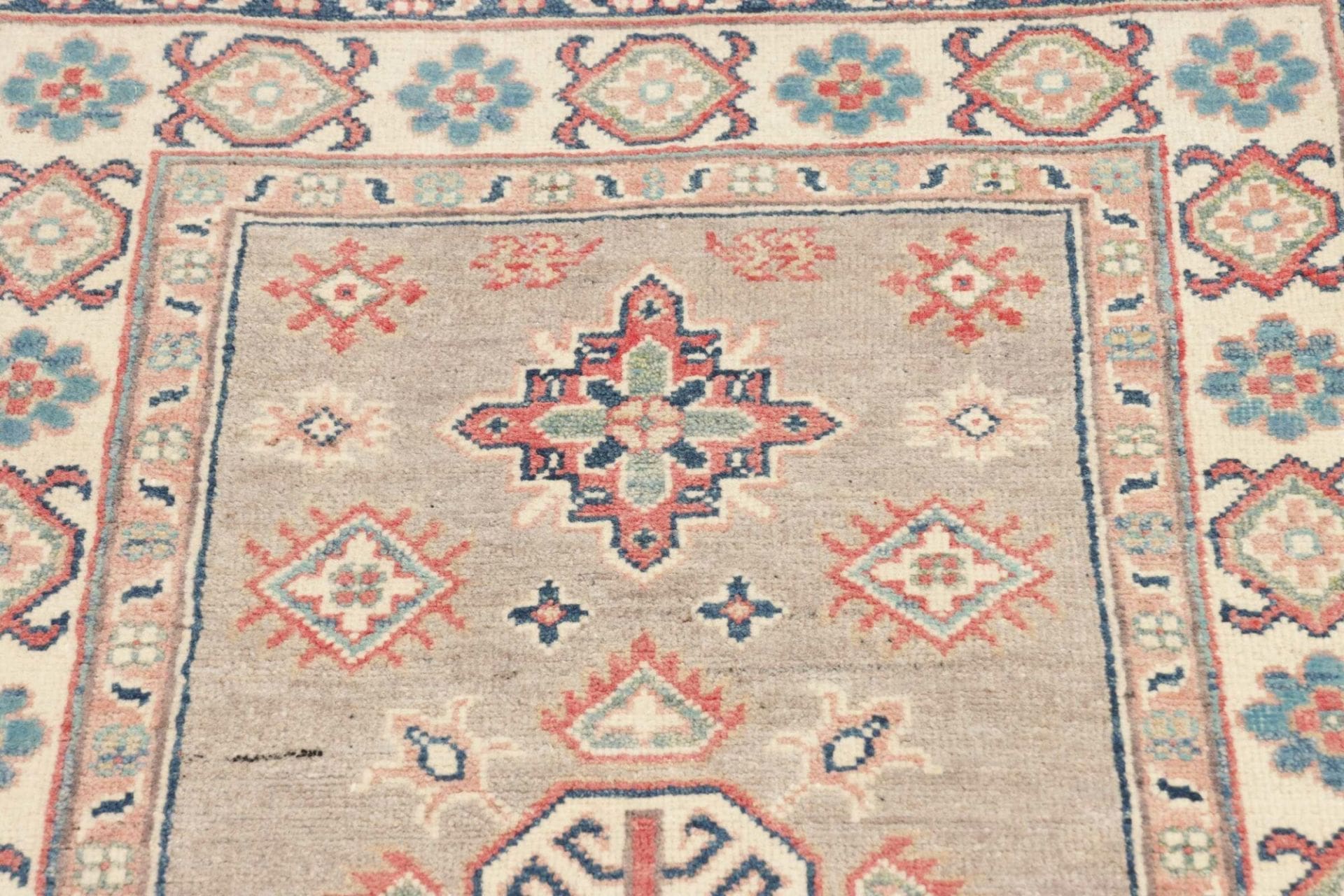 Kazak Orientteppich 82 × 125 cm aus Wolle, handgeknüpft